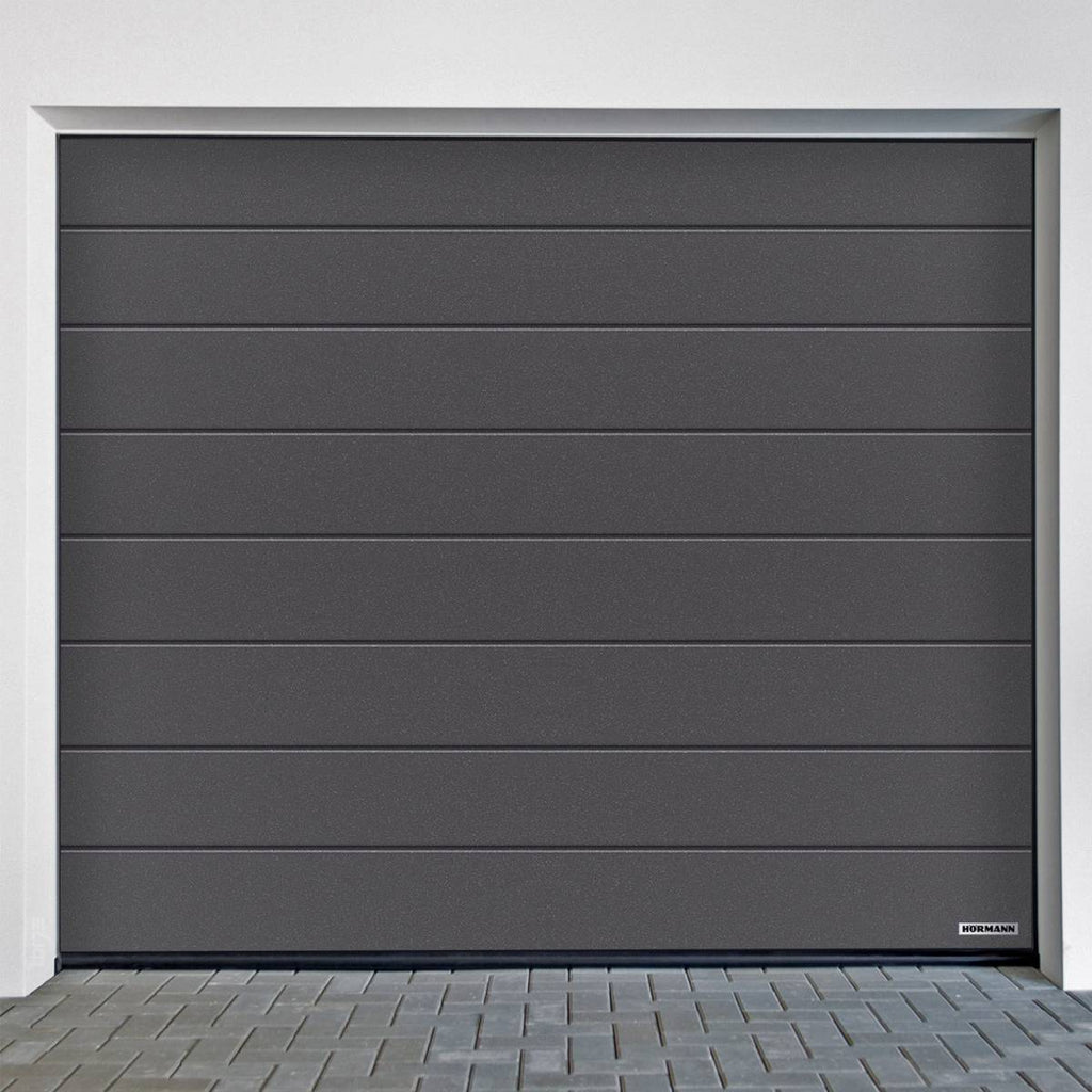 Garagepoort Hörmann RenoMatic M-Profilering Planar met moderne uitstraling en grijze afwerking.