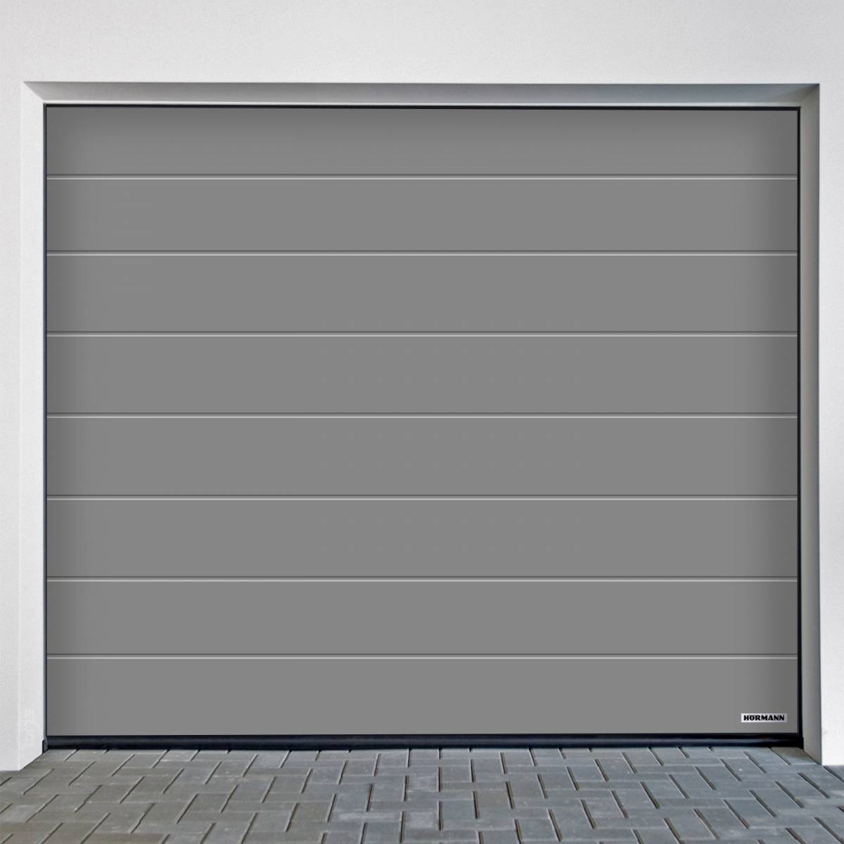 Puerta seccional Hörmann RenoMatic Acanalado M Planar con diseño moderno y acabado en color gris.