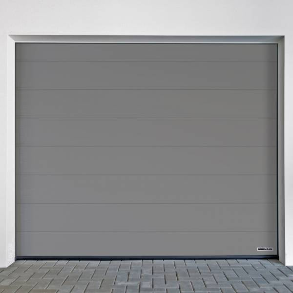 Puerta de garaje Hörmann RenoMatic Acanalado M Woodgrain en color gris, elegante y moderna.